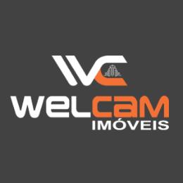 logo da empresa Welcam Imobiliária e Construtora